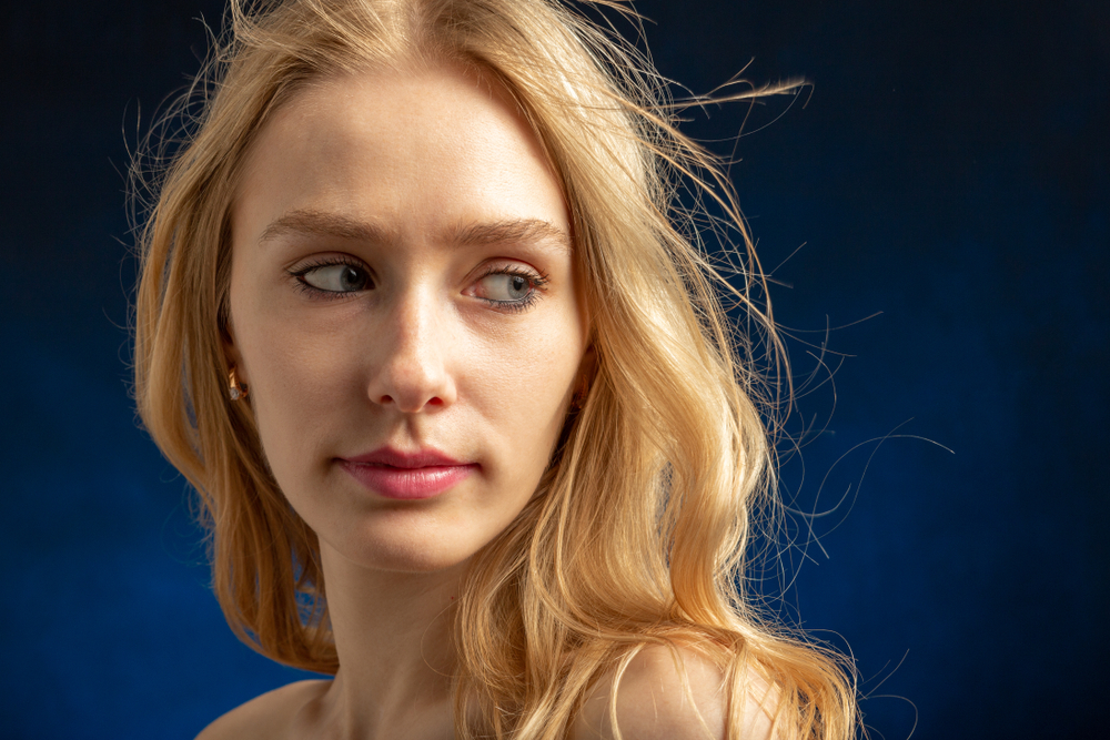 Young trans or non-binary person after gender affirming laser hair removal in NYC